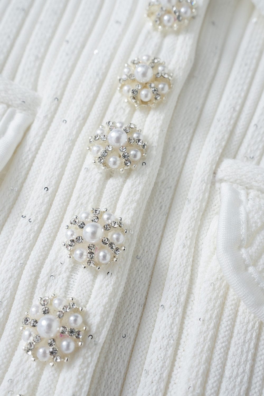 Moon 45 Elegant Pearl Button Knitted Ruffle Hem Mini Skirt